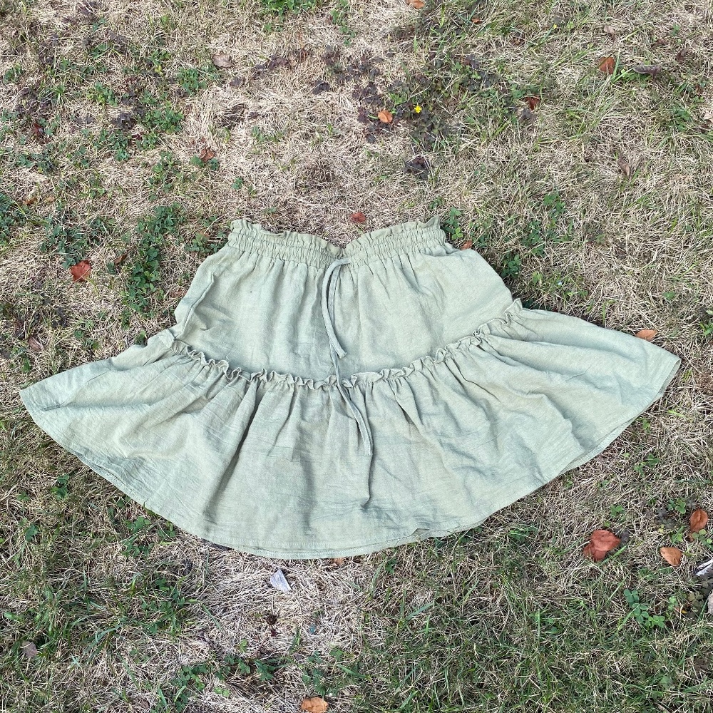 Short green skirt